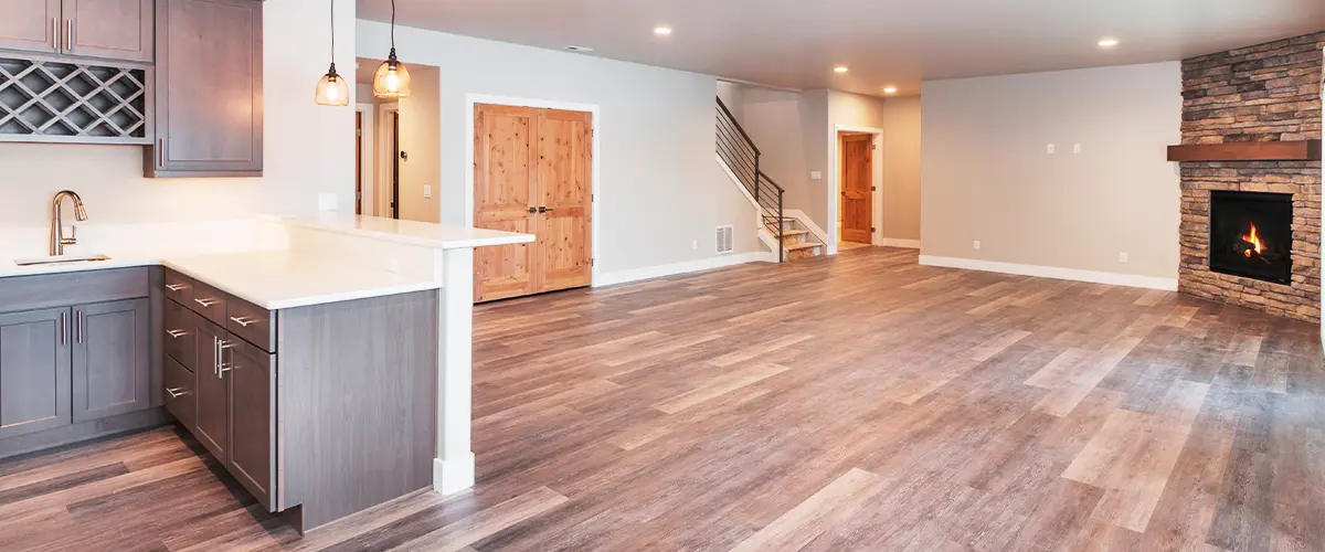 spacious open concept basement kitchen fireplace